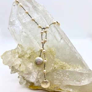 Coin pearl lariat necklace on gold chain w small pearl accents. leather cord